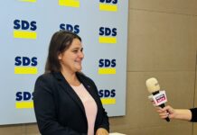 Golobova božičnica je le nov davek: SDS ponuja pravo rešitev brez bremen za podjetja in z višjimi neto plačami